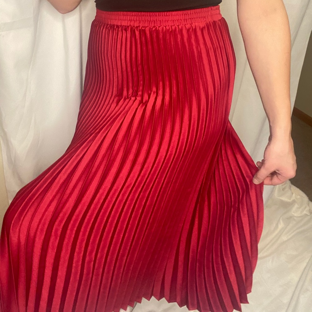 Red pleated skirt